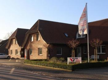 Firmensitz mit Fahne